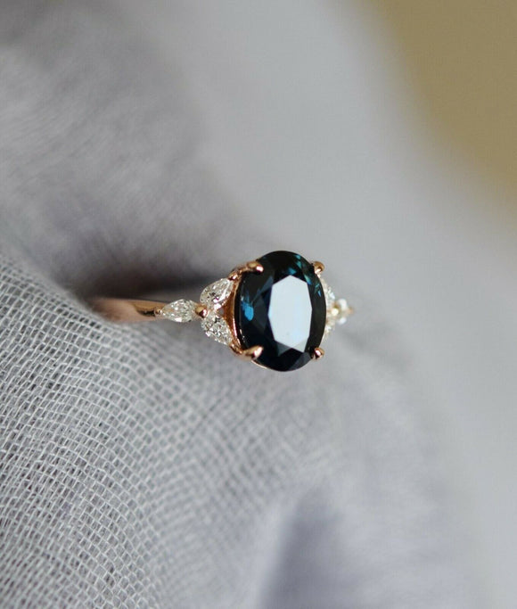 2.4ct Oval Cut London Blue Topaz Marquise Accents Ring  14k Rose Gold Finish