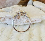 2.3ct Emerald Cut Simulated Diamond Three Stone Ring 14k White Gold Plated