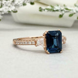 2.2ct Emerald Cut London Blue Topaz Solitaire with Accent Ring 14k RoseGold Over