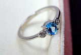 0.25ct Engagement Ring Oval Cut Blue Topaz Minimalist Trilogy 14k WhiteGold Over