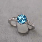 2.1ct Round Cut Blue Topaz Solitaire with Accent Ring 14k White Gold Finish