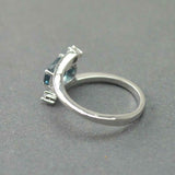 1.2ct Oval Cut London Blue Topaz Swirl Solitaire Trilogy Ring 14k WhiteGold Over
