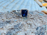 2.6ct Emerald Cut Blue Emerald Bezel Set Solitaire Ring 14k White Gold Finish
