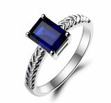 2.3ct Emerald Cut Blue Sapphire Braided Shank Solitaire Ring 14k White Gold Over