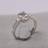 2.1ct Oval Cut Morganite Solitaire with Accent Trilogy Ring 14k White Gold Over