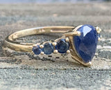 2.5ct Pear Cut Blue Sapphire Solitaire with Accent Ring 14k Yellow Gold Finish
