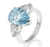 2.4ct Pear Cut Blue Topaz Pear Accent Trilogy Ring 14k White Gold Finish