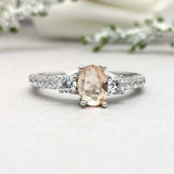 2ct Oval Cut Morganite Solitaire with Accent Trilogy Ring 14k White Gold Finish