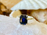 2.2ct Emerald Cut Simulated Blue Sapphire Solitaire Ring 14k White Gold Plated