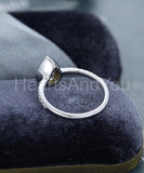 0.5ct Pear Cut Simulated Diamond Accents Bezel Set Ring 14k White Gold Plated