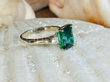 2.2ct Green Emerald Cut Simulated Trilogy Engagement Ring 14k White Gold Plated