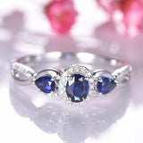 2.2ct Oval Cut Blue Sapphire Engagement Ring Halo Trilogy 14k White Gold Finish