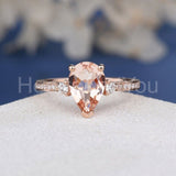 1.2ct Pear Cut Simulated Morganite Accented Trilogy Ring 14k Rose Gold Plated