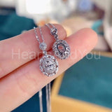 2ct Oval Cut Simulated Diamond Halo Pendant with Chain 14k White Gold Plated