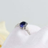 2ct Oval Cut Blue Sapphire Engagement Ring Diamond Trilogy 14k White Gold Finish