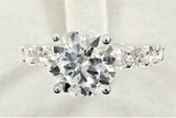 2.25ct Round Cut Moissanite Solitaire with Accents Ring 14k White Gold Plated