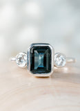 2.2ct Emerald Cut Simulated London Blue Topaz Trilogy Ring 14k White Gold Plated