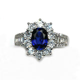 2ct Oval Cut Blue Sapphire Floral Halo Baguette Accent Ring 14k Rose Gold Finish