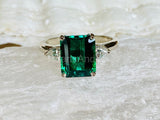 2.2ct Green Emerald Cut Simulated Trilogy Engagement Ring 14k White Gold Plated