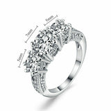 4Ct Round Cut Diamond Trilogy Engagement Ring 14K White Gold Finish with Accents