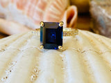 2.2ct Emerald Cut Blue Sapphire Solitaire with Accent Ring 14k White Gold Finish