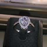 4Ct Pear Cut DVVS1 Diamond Accents Halo Engagement Ring 14K White Gold Finish