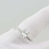 1.6ct Oval Cut Diamond 4 Prong Solitaire with Accents Ring 14k White Gold Finish