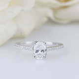 1.6ct Oval Cut Diamond 4 Prong Solitaire with Accents Ring 14k White Gold Finish