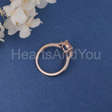 1.2ct Pear Cut Simulated Morganite Accented Trilogy Ring 14k Rose Gold Plated