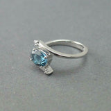 1.2ct Oval Cut London Blue Topaz Swirl Solitaire Trilogy Ring 14k WhiteGold Over