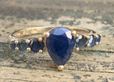2.5ct Pear Cut Blue Sapphire Solitaire with Accent Ring 14k Yellow Gold Finish