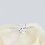 1.6ct Oval Cut Diamond 4 Prong Solitaire with Accents Ring 14k White Gold Finish