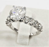 2.25ct Round Cut Moissanite Solitaire with Accents Ring 14k White Gold Plated