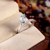 0.5ct Pear Cut Simulated Aquamarine Bypass Engagement Ring 14k White Gold Plated