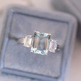 2.3ct Emerald Cut Simulated Blue Aquamarine Trilogy Ring 14k White Gold Plated