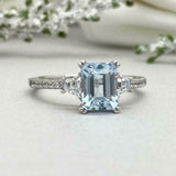 2.2ct Emerald Cut Blue Aquamarine Solitaire with Accent Ring 14k White Gold Over