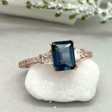 2.2ct Emerald Cut London Blue Topaz Solitaire with Accent Ring 14k RoseGold Over