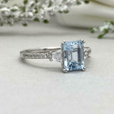 2.2ct Emerald Cut Blue Aquamarine Solitaire with Accent Ring 14k White Gold Over