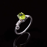 0.5ct Oval Cut Green Peridot Solitaire with Accent Ring 14k White Gold Finish