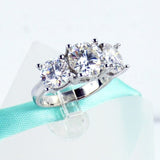 2.25ct Round Cut Moissanite Three Stone Engagement Ring 14k White Gold Plated