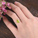 1.2ct Emerald Cut Green Peridot Solitaire with Accents Ring 14k Rose Gold Finish