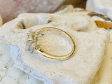 2.3ct Emerald Cut Simulated Diamond Three Stone Ring 14k White Gold Plated