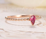 0.4ct Pear Cut Simulated Ruby Beaded Ball Solitaire Ring 14k Rose Gold Plated