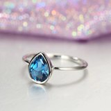 0.5ct Bezel Set Solitaire Ring Pear Cut London Blue Topaz 14k White Gold Finish