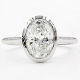 2.2ct Oval Cut Simulated Diamond Bezel Set Engagement Ring 14k White Gold Plated