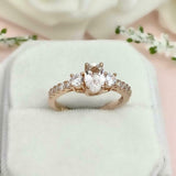 2ct Oval Cut Diamond Solitaire with Accent Trilogy Ring 14k Yellow Gold Finish