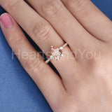 1.2ct Pear Cut Simulated Morganite Accented Trilogy Ring 14k Rose Gold Plated