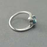 1.2ct Oval Cut London Blue Topaz Swirl Solitaire Trilogy Ring 14k WhiteGold Over