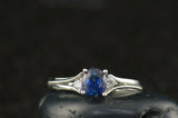1Ct Oval Cut Blue Sapphire Round Diamond Accent Trilogy Ring 14K White Gold Over