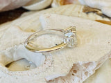 2.3ct Emerald Cut Simulated Diamond Three Stone Ring 14k White Gold Plated